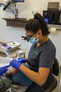 dentist working with patient